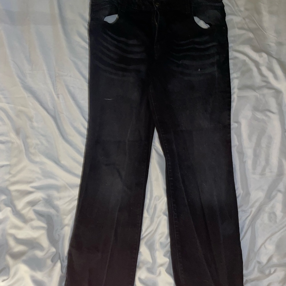 Black distressed plus sized jeans